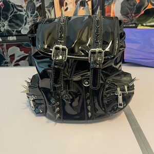 Dolls Kill Black Mini Spiked Patent Backpack